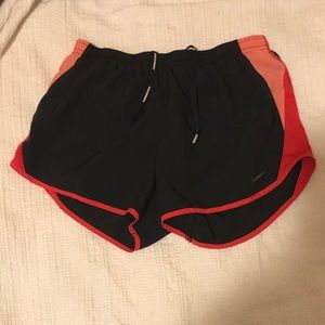 Black Nike running shorts